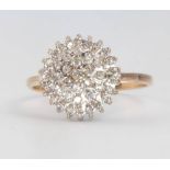 A 9ct yellow gold diamond cluster ring size P 2.4 grams gross