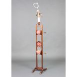 An Edwardian mahogany squirrel cage wool winder, converted for use as an electric standard lamp