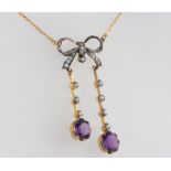 An Edwardian style silver gilt amethyst and seed pearl necklace