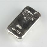 A silver 1000 gram ingot stamped Umicore no. 434385