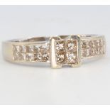 A 14ct yellow gold princess cut diamond ring size P