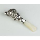 An Edwardian silver and mother of pearl baby rattle/teether in the form of a spaniels head 13cm