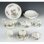 A Wedgwood Charnwood pattern tea and dinner service comprising breakfast teapot, milk jug, lidded