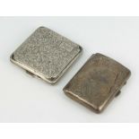 Two silver cigarette cases with scroll decoration Birmingham 1919 and Birmingham 1931, 159 grams