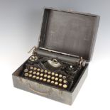 An Underwood portable manual typewriter the reverse marked patent Made in USA other patents