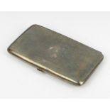 A silver cigarette case of plain form Sheffield 1922 168 grams