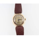 A lady's 9ct yellow gold Longines wristwatch with seconds at 6 o'clock, 24mm case This watch