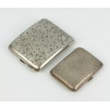 Two silver cigarette cases with chased decoration Birmingham 1914 and 1931, 184 grams