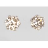 A pair of platinum single stone diamond ear studs, 0.3ct