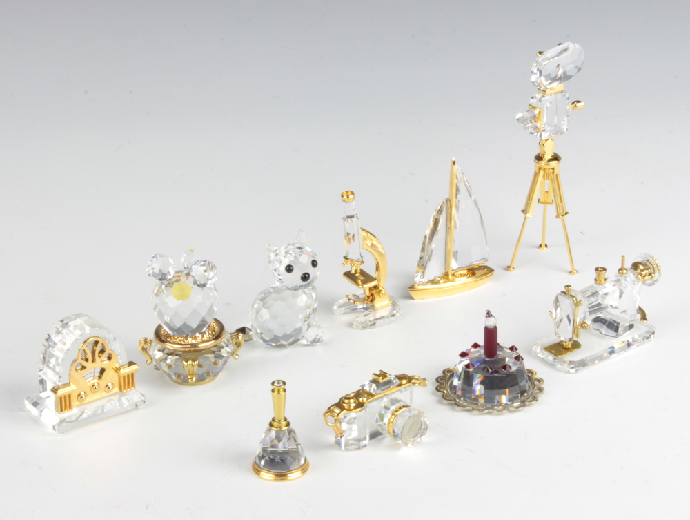 Six Swarovski Classic models - cactus, radio, sewing machine, film camera, microscope, camera and