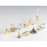 Six Swarovski Classic models - cactus, radio, sewing machine, film camera, microscope, camera and