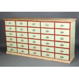 An impressive pine red and turquoise painted bank of 32 drawers with chrome handles 102cm h x