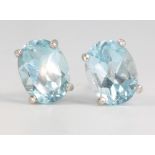 A pair of topaz and silver ear studs 1.2ct