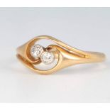 An 18ct yellow gold 2 stone diamond ring 3.1 grams, size P 1/2