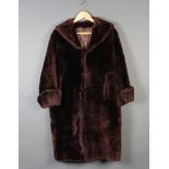 A lady's brown beaver lamp full length coat