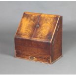 Parkins and Gotto, 24-26 Oxford Street London, a Victorian light oak wedge shaped stationery box
