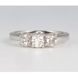 A 14ct white gold 3 stone diamond ring approx. 1ct, size M