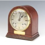 Of military interest, a 1930's striking mantel clock with silvered dial contained in an arched