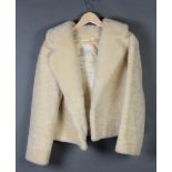 A lady's white three quarter length beaver lamb jacket by Cornelius of Sydney Australia The lining