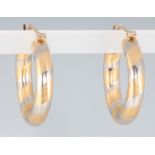 A pair of 9ct 2 colour gold earrings 4.3 grams