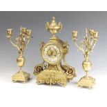 Fritz Marti, a 19th Century French 3 piece 8 day striking clock garniture, striking on a bell with