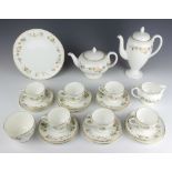 A Wedgwood Mirabelle tea and coffee set comprising teapot, coffee pot and lid, milk jug, sugar bowl,