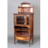 A rosewood display cabinet with raised back, the base fitted shelves enclosed by a bevelled plate