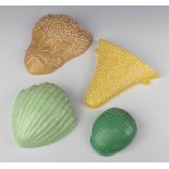 A Sylvac green wall pocket in the form of a flat cap 721 12cm, a yellow ditto with seaweed