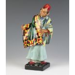 A Royal Doulton figure - Carpet Seller HN1464 23cm