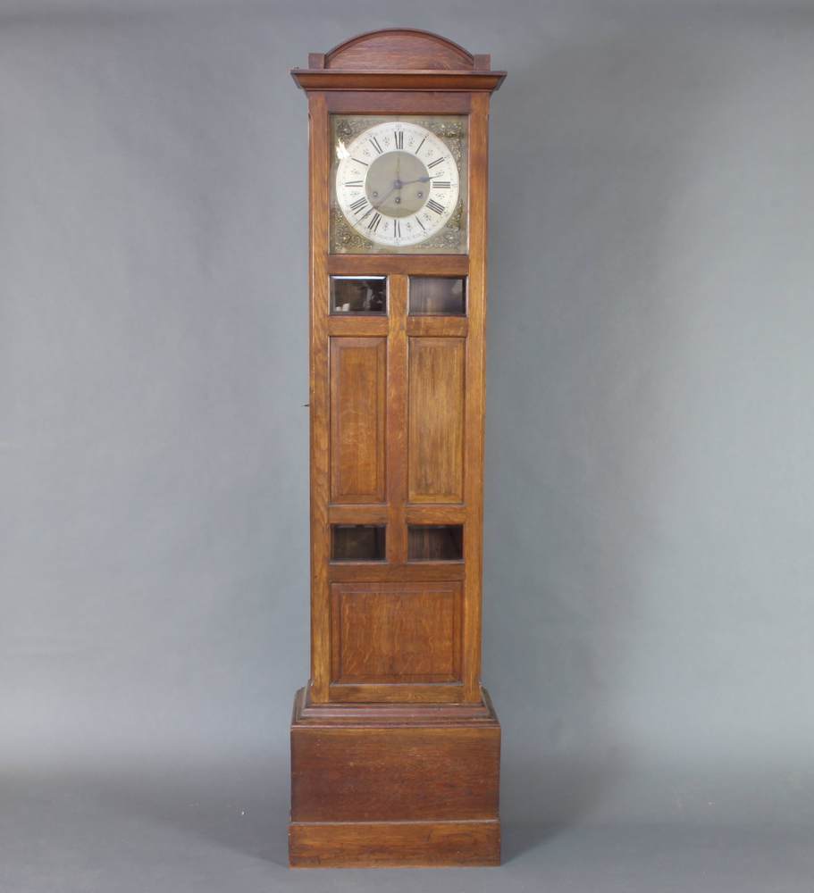 An Edwardian Art Nouveau 8 day striking longcase clock with 32cm square silvered dial with gilt