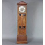 An Edwardian Art Nouveau 8 day striking longcase clock with 32cm square silvered dial with gilt