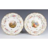 A pair of 19th Century Meissen plates decorated with a fete gallant scene and riders on horseback
