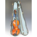 F C Cockman, a violin with 35cm 2 piece back, bearing paper label - F C Cockman London 1912,