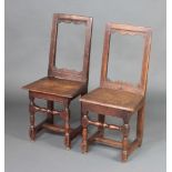 A matched pair of 16th Century style oak and elm bar back stools raised on turned supports with H