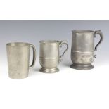 A 19th Century pewter quart tankard marked X, a crown and rose pewter pint tankard and a George V