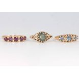 Three 9ct yellow gold gem set rings size N, 0 1/2 and P