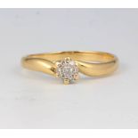An 18ct yellow gold diamond cluster ring size Q 1/2