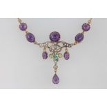 A silver gilt Edwardian style amethyst, peridot, emerald and diamond necklace