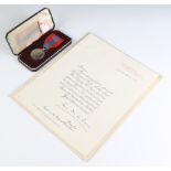 An Imperial Service Medal to Miss Aline M.Suffolk boxed together with paperwork