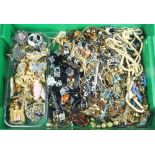 A quantity of costume jewellery including designer brooches