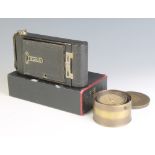 A Kodak No.1 pocket camera boxed together with a reproduction compass contained in a brass gimbal