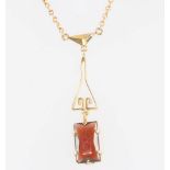 A 9ct yellow gold garnet pendant and chain This lot probably dates from the 80s/90s. The chain is