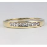 A 9ct white gold half eternity paste set ring