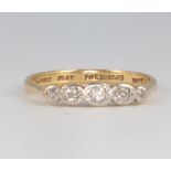 An 18ct yellow gold 5 stone diamond ring size N 2.3 grams