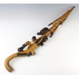 An African Nyami Nyami style carved wooden walking stick, carved serpent, tortoise, crocodile, 2