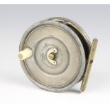 A 1920's Hardy Uniqua 3 3/8" trout fishing reel with horseshoe latch, white ivorine handle and