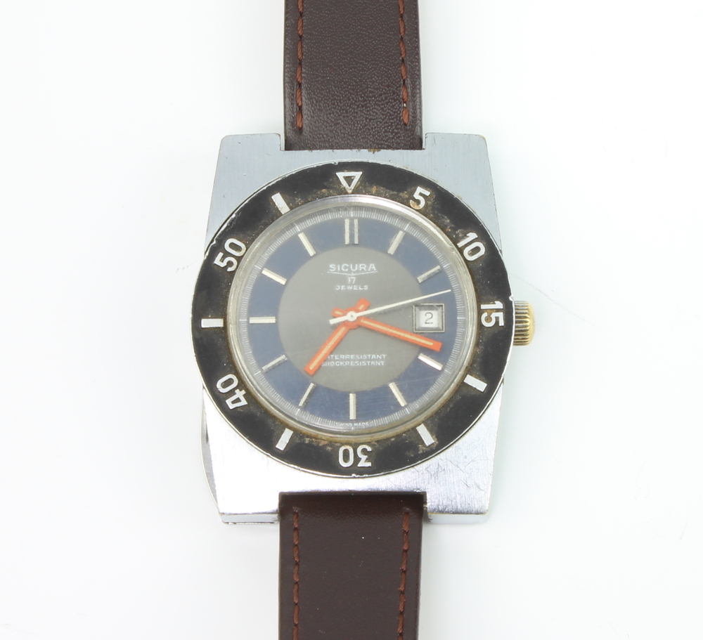A gentleman's 1970's Sicura calendar diving watch with concealed pen knife blade contained in a
