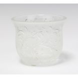 A Lalique candle holder, the frosted ground decorated with scrolling flowers, signature in lower