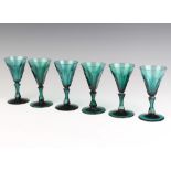 A set of 6 Victorian green glass faceted tapered wines 13cm