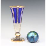 An early 20th Century Bohemian flash glass tapered vase 23cm and a Studio Glass paperweight Orient